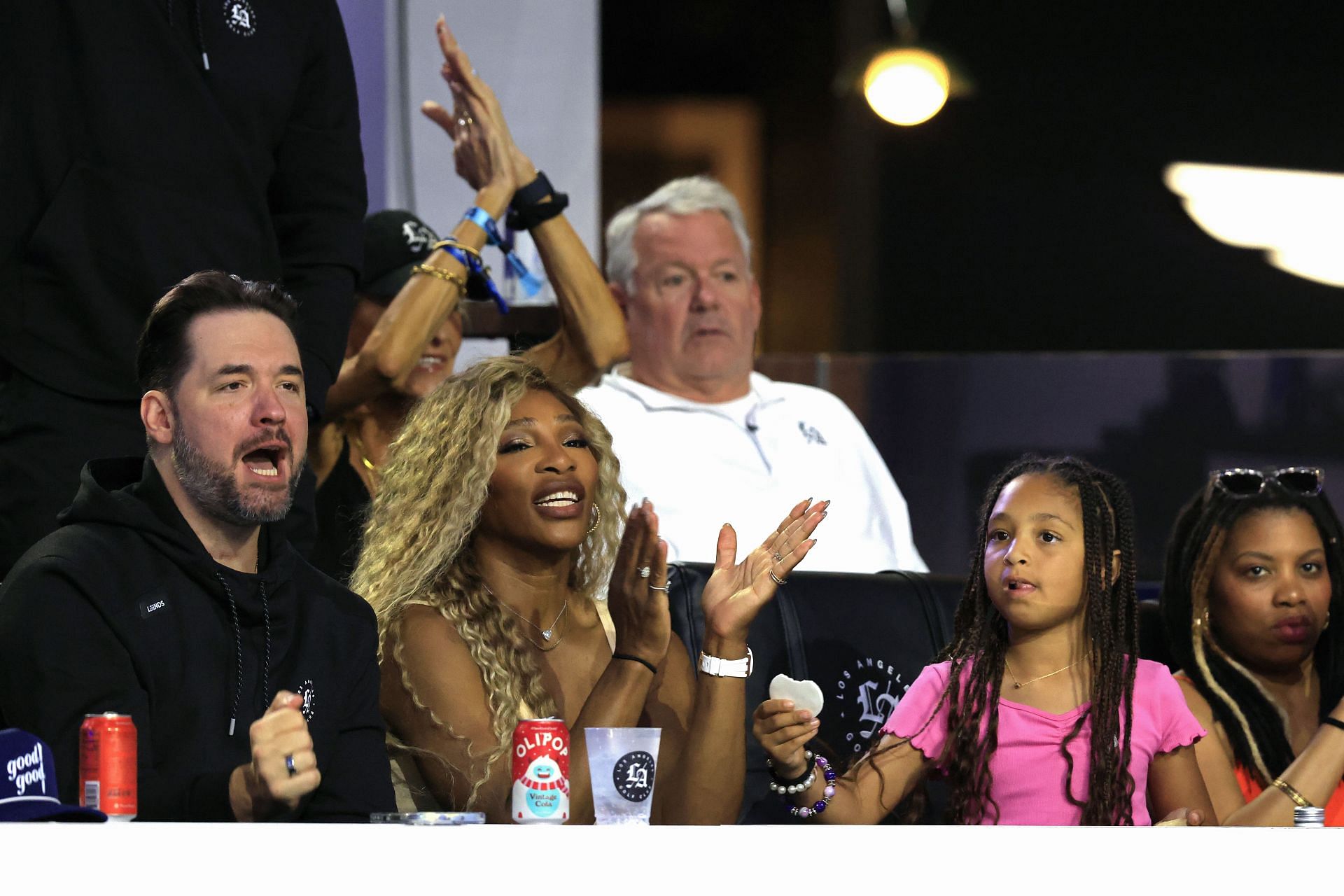 Serena Williams with Alexis Ohanian at an LAGC game - Source: Getty